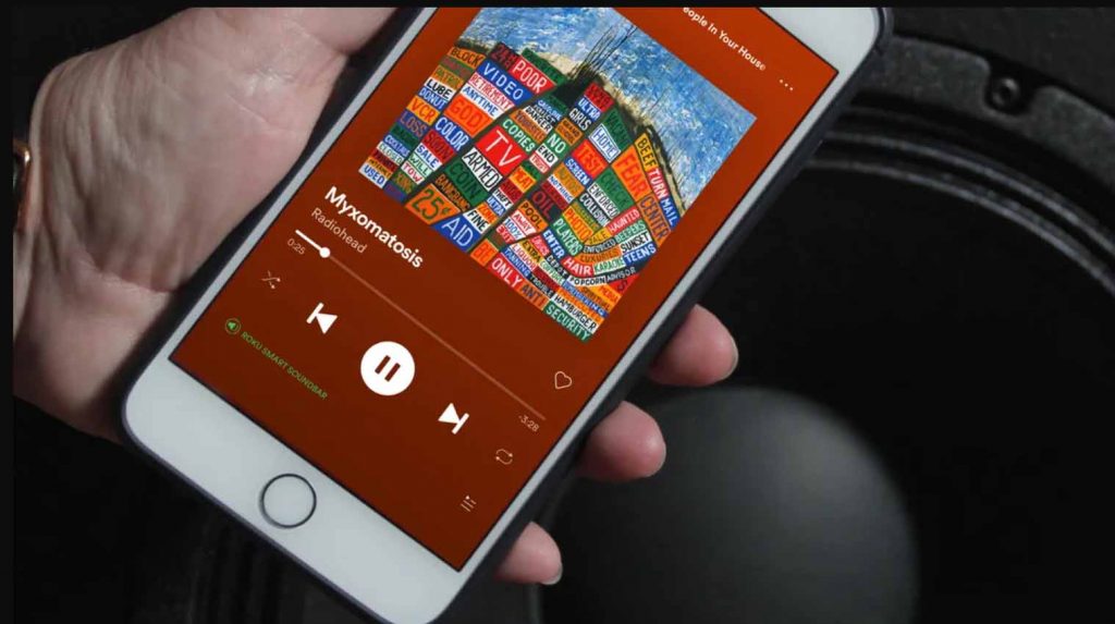 a picture showing spotify on mobile screen
