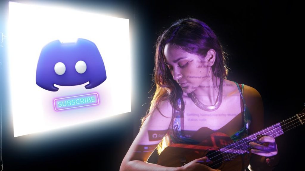 Image of the blog How to monetize Discord with a girl holding a guitar and a screen with the Discord logo behind it