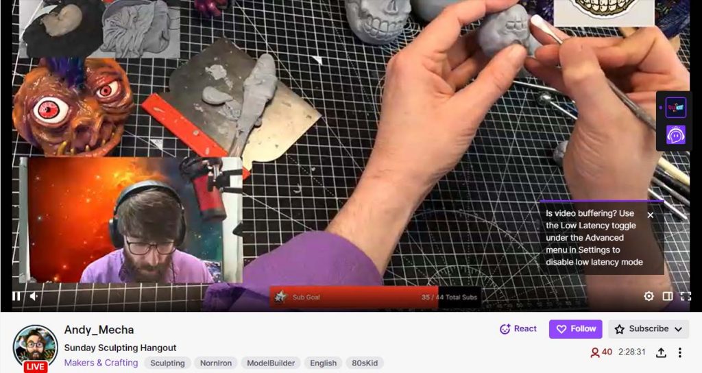 a sculptor making a character on Twitch